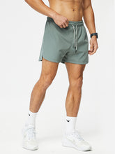 Load image into Gallery viewer, Men&#39;s Breathable Loose Version Quick-drying Running Training Three-quarter Shorts +
